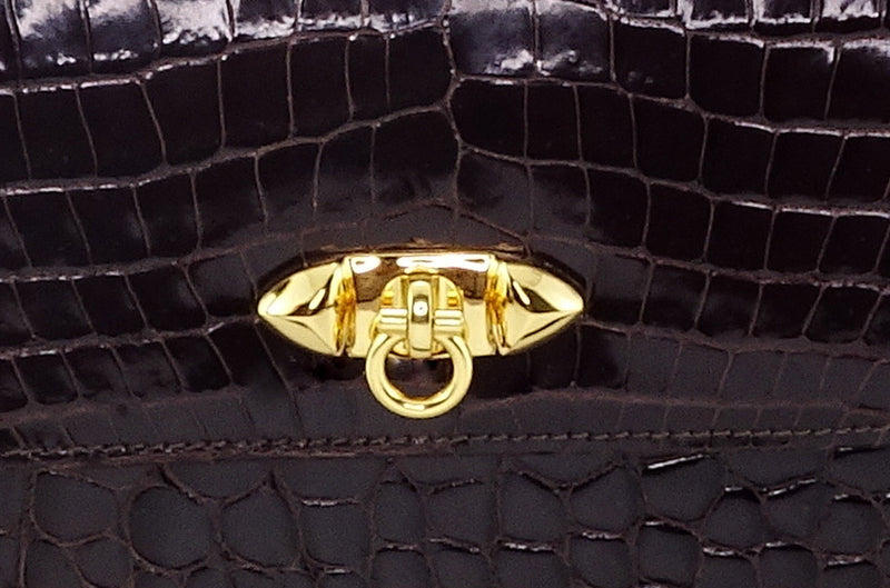 Handbag - cross body - (Tanya) Dark brown crocodile with handle. A photo of the front closure fitting.