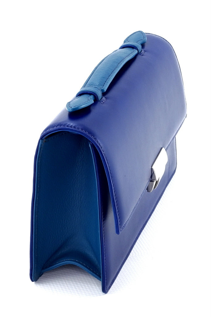 Handbag - cross body - (Tanya) Royal & Azure leather with Handle. A side view which shows the contrasting colours. The azure handle and side and bottom gussets.