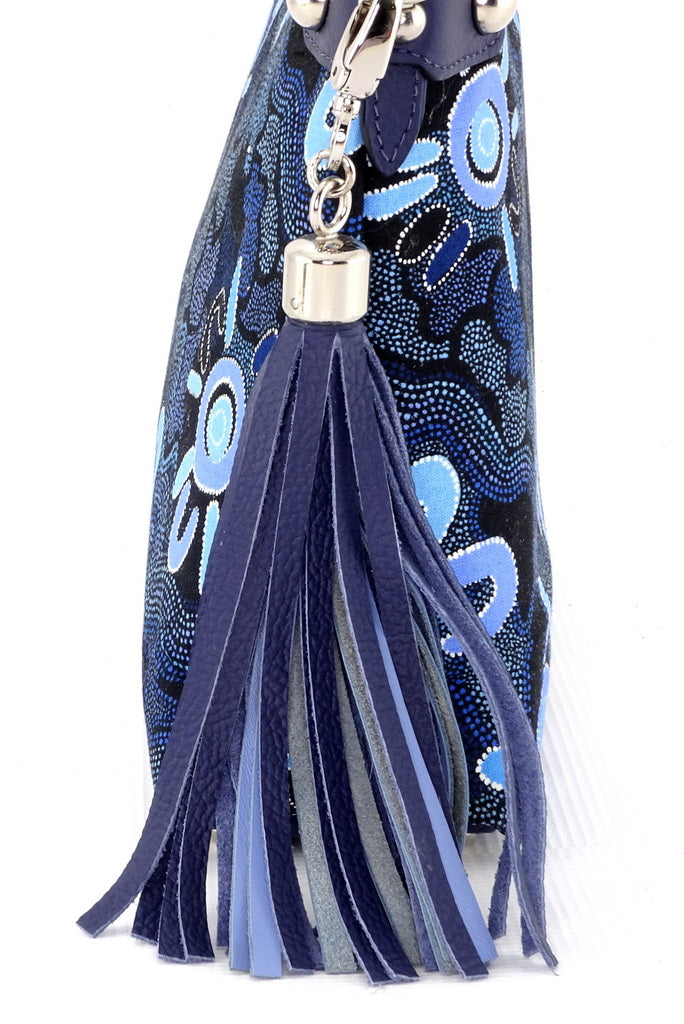 Tote Bag - small - (Rosie) Aboriginal print fabric with navy blue leather, close up of tassel