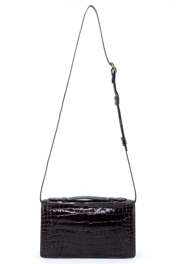 Handbag - cross body - (Tanya) Dark brown crocodile with handle. The back view of the bag with the shoulder straps fully extended.