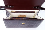 Handbag - cross body - (Tanya) Dark brown crocodile with handle. The inside view from the top showing the shoulder strap attachment method.