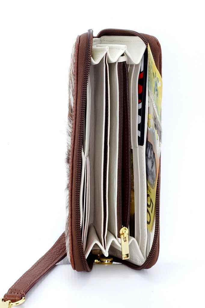 Purse - zip around - (Michaela) Tan hair on cow hide showing inside pockets in use