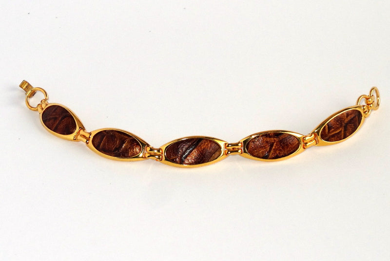 Gold plated bracelet in copper brown snake printed leather