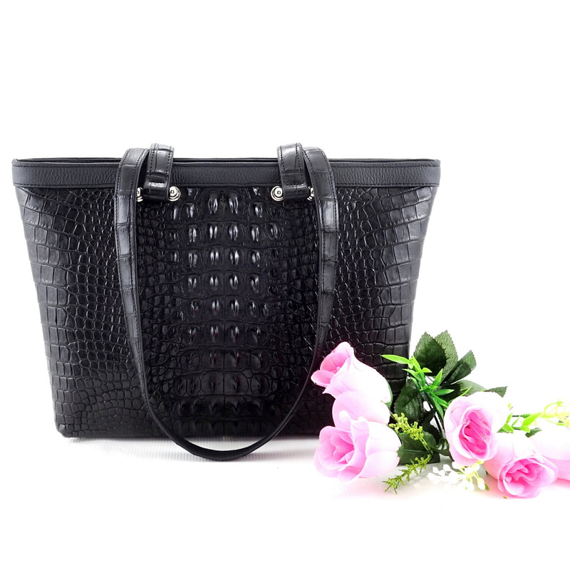 Black trophy skin crocodile cut Emily tote bag showing front view with shoulder straps down & flowers