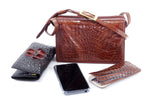 Handbag (Riley) Cross body bag havana tan crocodile elbows & leather showing what accessories this bag can hold