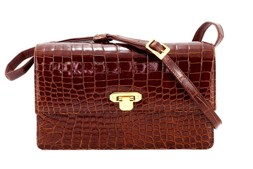 Handbag - cross body - (Tanya)  Cognac Tan glaze finish crocodile. This is a front view with shoulder strap attached.