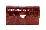Handbag - cross body - (Tanya)  Cognac Tan glaze finish crocodile. The front view showing as a clutch bag with shoulder strap removed.