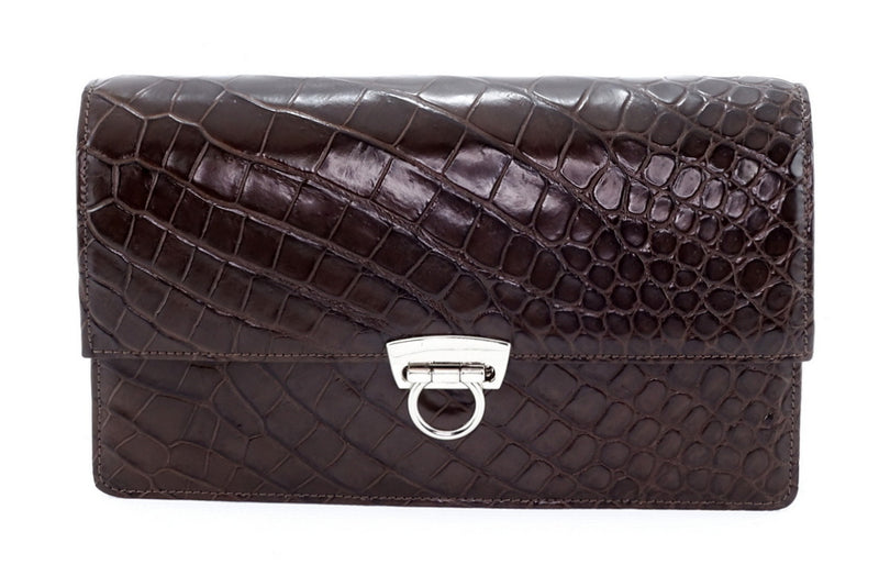Handbag - cross body - (Tanya)  Chocolate matte crocodile. Showing the handbag as a clutch bag.