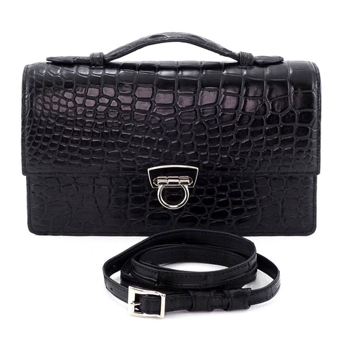 Handbag - cross body - (Tanya)  Black matt crocodile with Handle. This photo shows the shoulder strap no attached and the lid handle in the raised position.