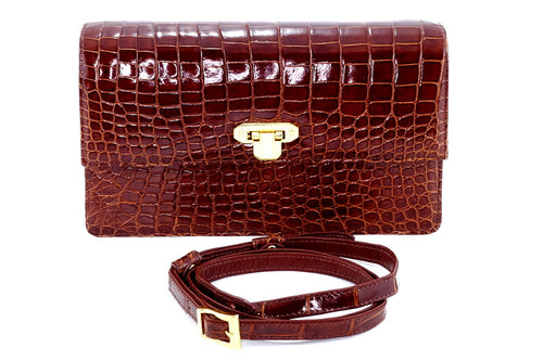 Handbag - cross body - (Tanya)  Cognac Tan glaze finish crocodile. The front view as a clutch bag with the shoulder strap removed and shown in the photo.