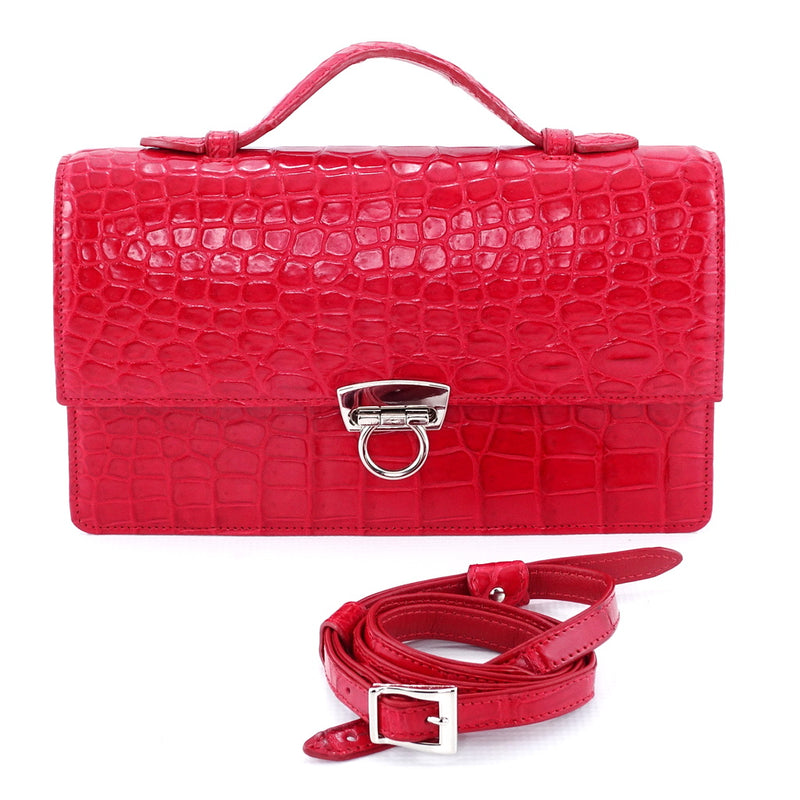 Handbag - cross body - (Tanya)  Red matt crocodile with Handle. A view of the front with handle coiled up in front removed.