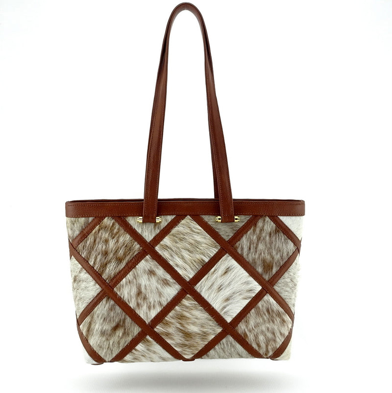 Emily  Tan Hair on hide patchwork leather tote bag floating with shoulder straps up