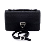 Handbag - cross body - (Tanya) black ostrich leather with handle. Lid handle sitting flat and shoulder strap in view not attached.