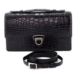 Handbag - cross body - (Tanya)  Black matt crocodile with Handle. The front view with lid handle sitting flat and the shoulder straqp removed.