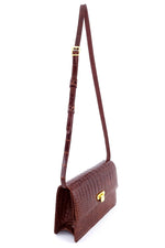 Handbag - cross body - (Tanya)  Cognac Tan glaze finish crocodile. This photo shown the handbag with shoulder straps fully extended. A side view of the Tanya crocodile bag.