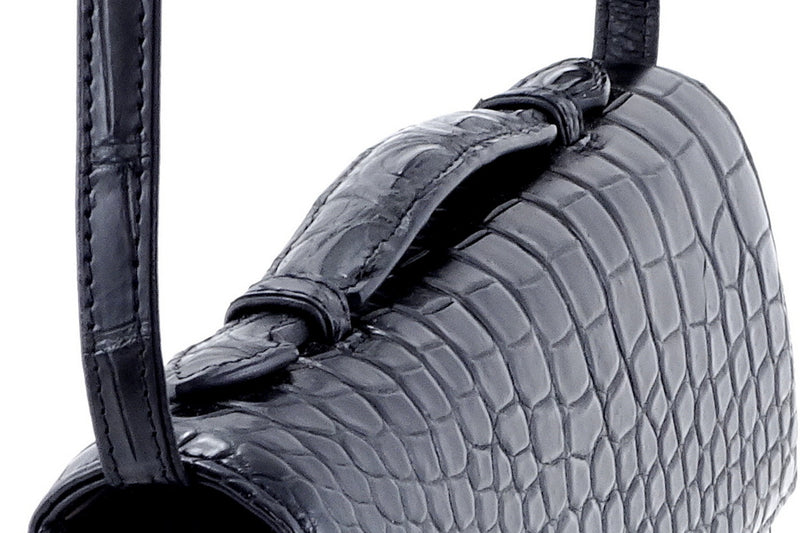 Handbag - cross body - (Tanya)  Black matt crocodile with Handle. A photo of the lid handle with the wonderful texture of the crocodile.