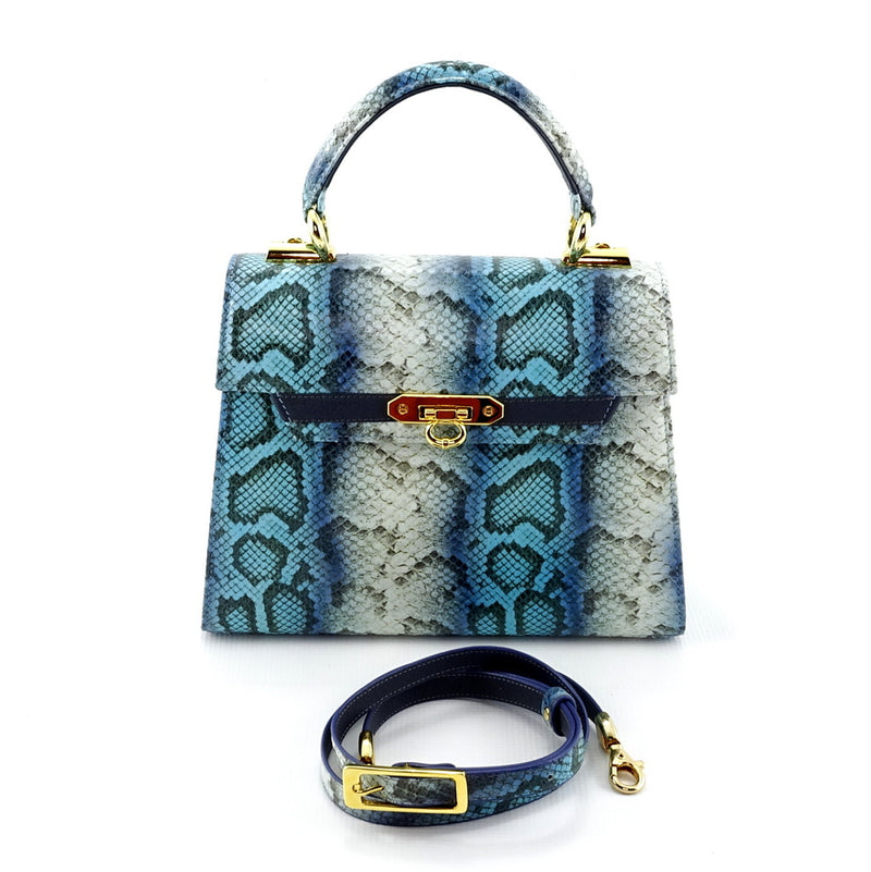 Handbag - traditional - (Beverly) Blue & white printed leather showing flat front view with shoulder strap detached 
