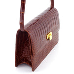 Handbag - cross body - (Tanya)  Cognac Tan glaze finish crocodile showing the side gusset.