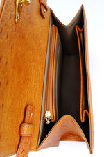 Handbag - cross body - (Tanya) Tan ostrich leather with handle. A view from the top looking down into the bag. This view shows the shoulder strap attachment method, the pockets and the colour of the leather lining.