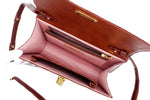 Handbag - cross body - (Tanya)  Cognac Tan glaze finish crocodile. Looking down into the bag from the top. This photo shows the internal pocket layout as well as how the shoulder strap is attached.