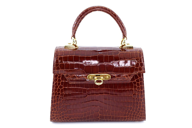 Handbag -traditional - (Beverly) Cognac tan glaze crocodile. This view is of the front of the bag without the shoulder strap attached.
