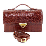 Handbag - cross body - (Tanya) Havana tan matt crocodile with Handle. A photo of the front view with lid handle raised and shoulder strap removed and coiled up infront of the crocodile handbag.