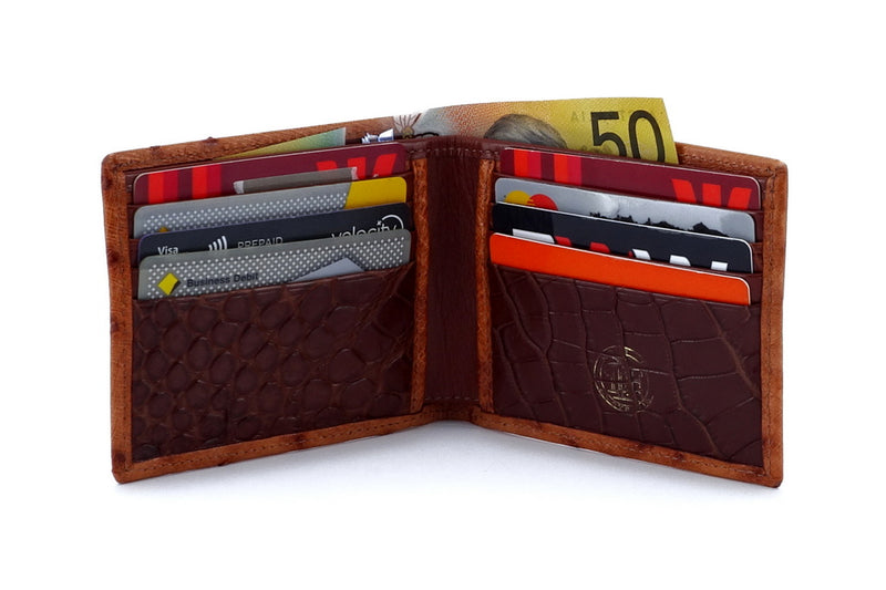 Wallet - medium bi fold - (Mason)  Tan ostrich wallet with brown internal showing internal pockets in use