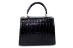 Handbag -traditional - (Beverly) - Black matt crocodile. The back view of the bag without the shoulder strap attached. This view shows off the slip pocket.
