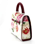 Handbag -traditional - (Beverly) - Fabric suede with floral pattern showing side view of gusset.