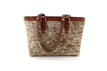 Tan Hair on hide with tripple blood knott strap leather tote bag showing side or back of bag