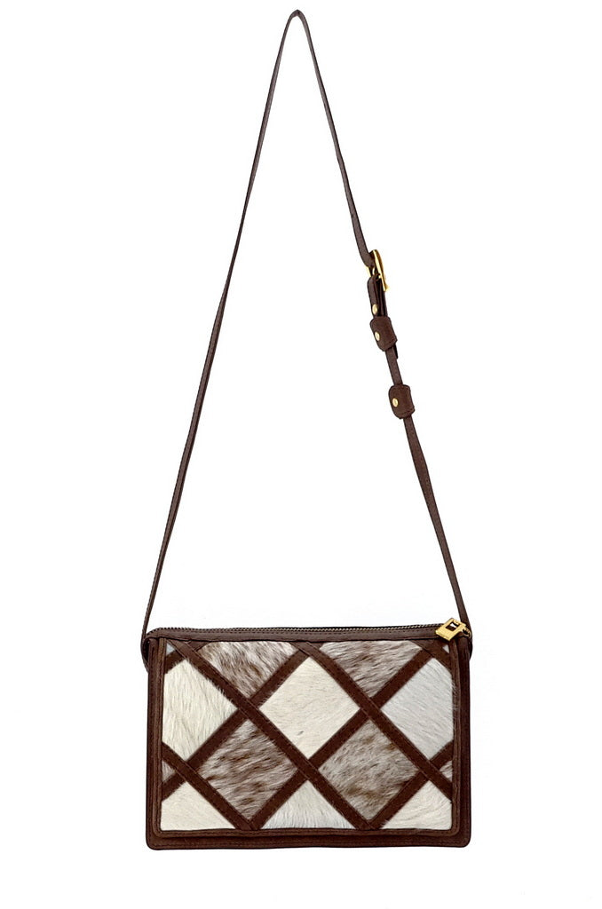 Handbag (Riley) Cross body bag - Brown patchwork Hair on cow hide, showing white side full view