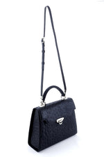 Handbag -traditional - (Joan)  Black ostrich skin leather angled front and side view with shoulder straps extended