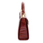 Handbag -traditional - (Beverly) Cognac tan glaze crocodile. A view of the left side gusset showing the pattern of the crocodile.