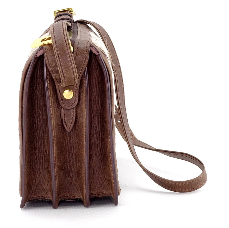 Handbag (Riley) Cross body bag - Brown patchwork Hair on cow hide, showing end view of gussets