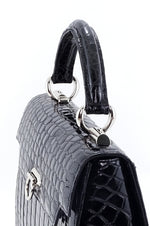 Handbag -traditional - (Joan) - Black glaze crocodile with nickel fittings. This photo shows the top handle attachment.