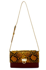 Handbag - cross body - (Tanya) Yellow print leather with handle. A long view with shoulder straps fully extended, handle sitting flat.