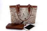 Tan Hair on hide with tripple blood knott strap leather tote bag with zip around purse and phone