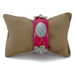 Bangle large (Kim) moulded round decorated leather jewellery - shown on display cushion