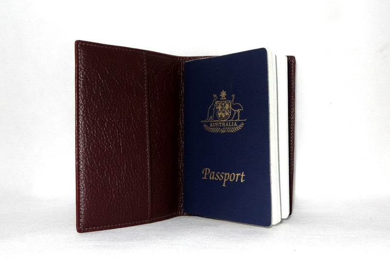 Passport-Holder - Black leather with burgundy lining left inside pocket Australian passport