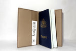 Passport Holder - Black leather with cream lining inside side 1