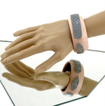 Bangle medium (Kim) moulded round decorated leather jewellery - pale pink leather with blue crocodile shapes