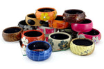 Bangle small (Kim) moulded round decorated leather jewellery - group photo on a mirror