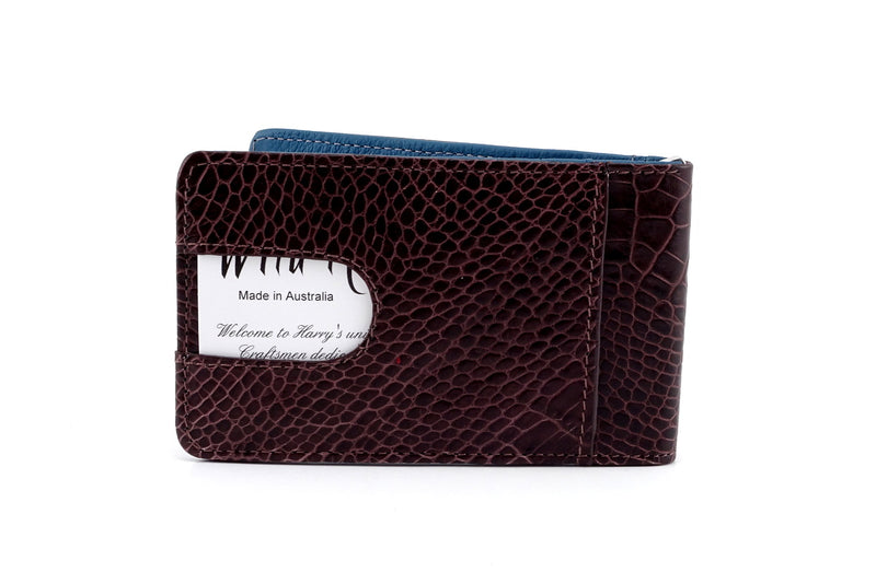 Bill fold back view crocodile print leather showing thumb pocket with business card in use
