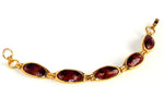 Gold plated bracelet in a burgundy foil ostrich printed leather