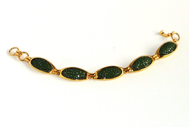 Bracelet gold palated green beady ray skin used