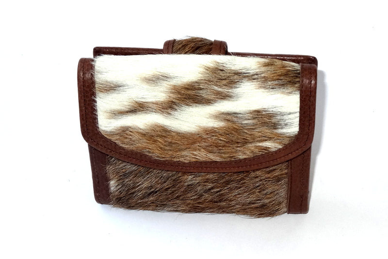 Anne  Tan and white hair on cow hide leather ladies purse front view