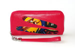 Michaela  Hot pink leather possum fabric detail ladies zip around purse side 1