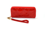 Michaela  Orange glaze crocodile gold fittings zip around purse side 1