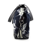 Felicity  Black leather with black & white fabric large tote bag end view tassel