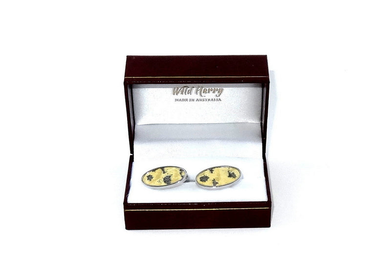 Cuff link   Leather printed costume jewellery shown in box